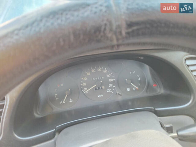 Зеленый Дэу Ланос, объемом двигателя 1.5 л и пробегом 254 тыс. км за 3200 $, фото 6 на Automoto.ua