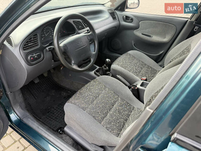 Зелений Деу Ланос, об'ємом двигуна 1.6 л та пробігом 141 тис. км за 2800 $, фото 13 на Automoto.ua