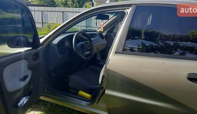 Зеленый Дэу Ланос, объемом двигателя 1.5 л и пробегом 205 тыс. км за 2500 $, фото 4 на Automoto.ua