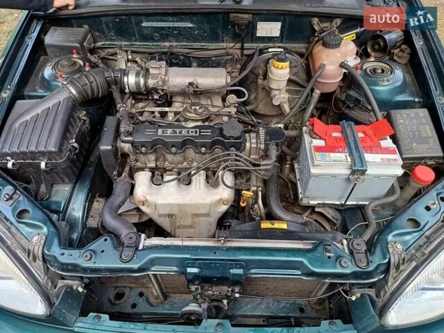 Зелений Деу Ланос, об'ємом двигуна 1.5 л та пробігом 293 тис. км за 1800 $, фото 17 на Automoto.ua