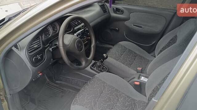 Зеленый Дэу Ланос, объемом двигателя 1.5 л и пробегом 278 тыс. км за 2600 $, фото 8 на Automoto.ua