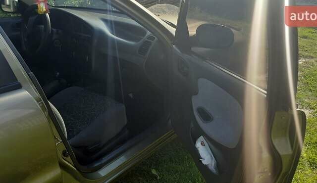 Зеленый Дэу Ланос, объемом двигателя 1.5 л и пробегом 205 тыс. км за 2500 $, фото 8 на Automoto.ua