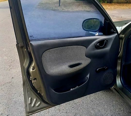 Зеленый Дэу Ланос, объемом двигателя 1.5 л и пробегом 130 тыс. км за 2000 $, фото 5 на Automoto.ua