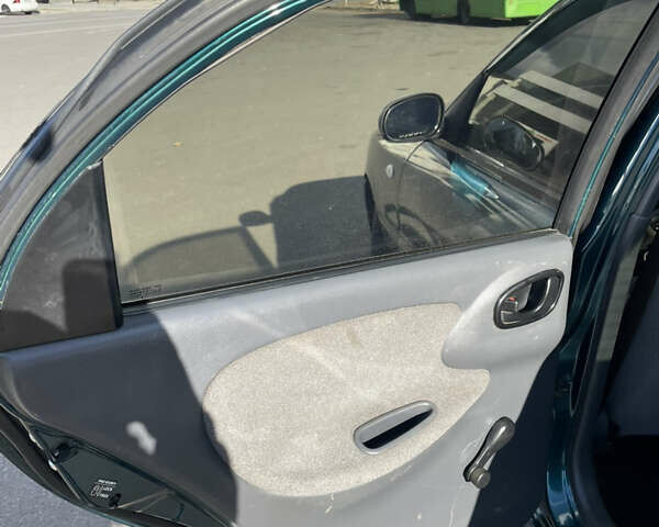 Зеленый Дэу Ланос, объемом двигателя 1.5 л и пробегом 149 тыс. км за 2050 $, фото 14 на Automoto.ua