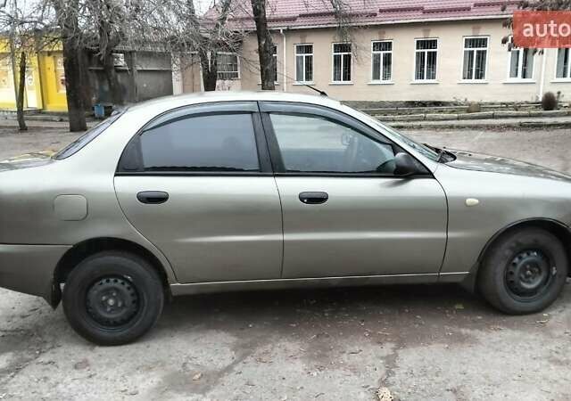 Зеленый Дэу Ланос, объемом двигателя 1.5 л и пробегом 221 тыс. км за 1900 $, фото 2 на Automoto.ua