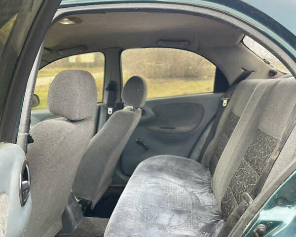 Зелений Деу Ланос, об'ємом двигуна 1.35 л та пробігом 256 тис. км за 1499 $, фото 15 на Automoto.ua