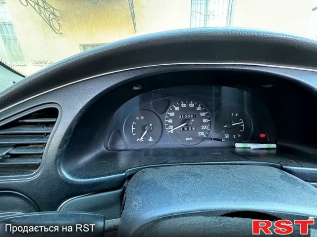 Зеленый Дэу Ланос, объемом двигателя 1.5 л и пробегом 33 тыс. км за 2200 $, фото 5 на Automoto.ua