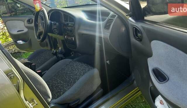 Зеленый Дэу Ланос, объемом двигателя 1.5 л и пробегом 205 тыс. км за 2500 $, фото 10 на Automoto.ua