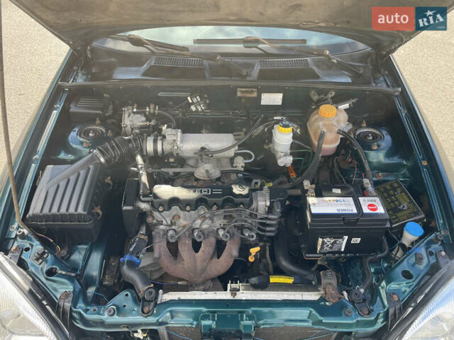 Зеленый Дэу Ланос, объемом двигателя 1.5 л и пробегом 149 тыс. км за 2050 $, фото 21 на Automoto.ua