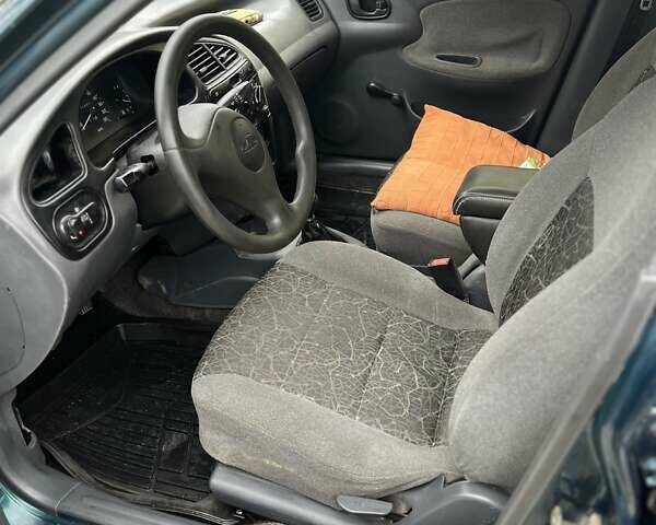 Зеленый Дэу Ланос, объемом двигателя 1.35 л и пробегом 171 тыс. км за 950 $, фото 3 на Automoto.ua