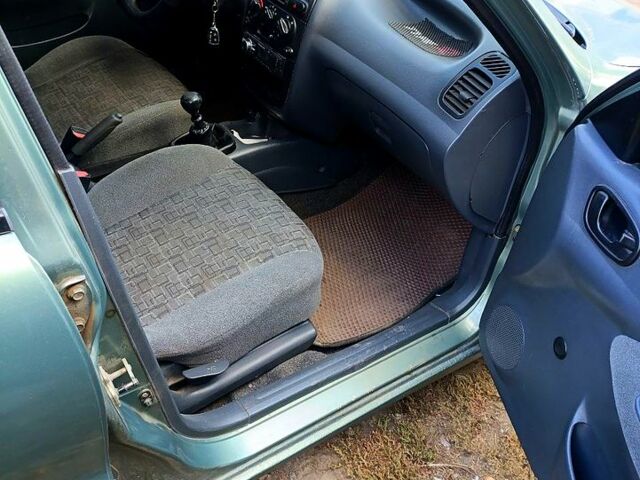 Зеленый Дэу Ланос, объемом двигателя 1.5 л и пробегом 184 тыс. км за 1900 $, фото 5 на Automoto.ua