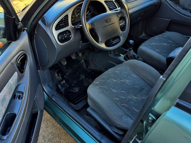 Зеленый Дэу Ланос, объемом двигателя 1.6 л и пробегом 212 тыс. км за 2550 $, фото 4 на Automoto.ua