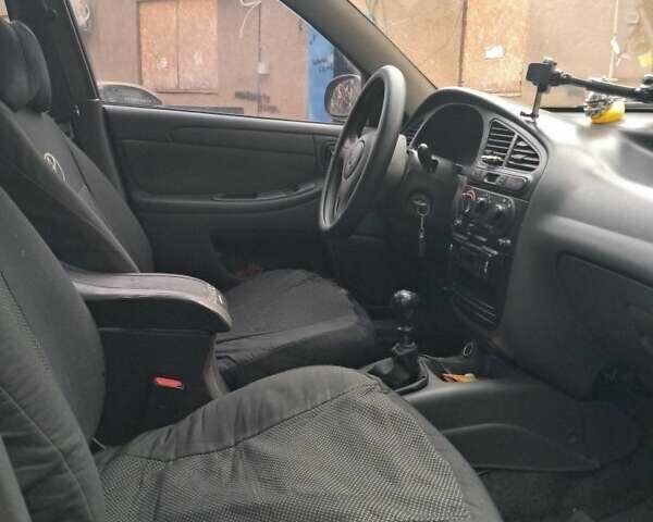 Зеленый Дэу Ланос, объемом двигателя 1.5 л и пробегом 255 тыс. км за 2100 $, фото 4 на Automoto.ua