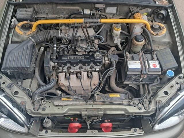 Зелений Деу Ланос, об'ємом двигуна 1.5 л та пробігом 255 тис. км за 2000 $, фото 9 на Automoto.ua