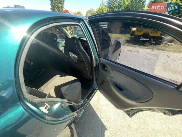 Зеленый Дэу Ланос, объемом двигателя 1.5 л и пробегом 290 тыс. км за 2550 $, фото 8 на Automoto.ua
