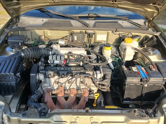 Зеленый Дэу Ланос, объемом двигателя 1.5 л и пробегом 170 тыс. км за 3300 $, фото 16 на Automoto.ua