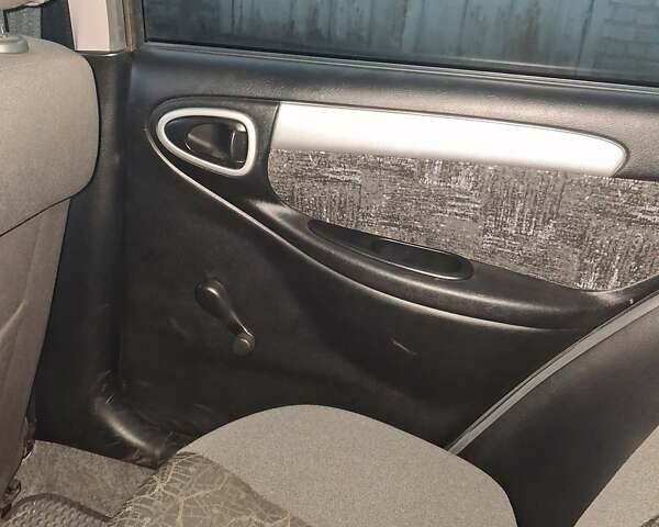 Зеленый Дэу Ланос, объемом двигателя 1.5 л и пробегом 188 тыс. км за 3000 $, фото 5 на Automoto.ua