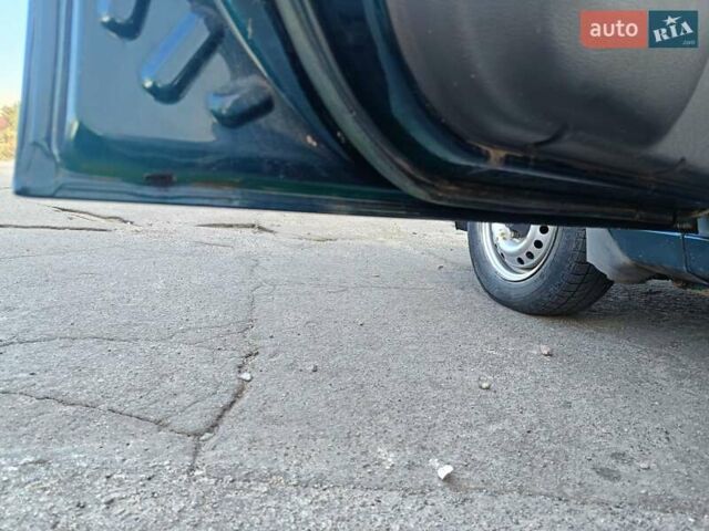 Зелений Деу Ланос, об'ємом двигуна 1.5 л та пробігом 193 тис. км за 1599 $, фото 21 на Automoto.ua
