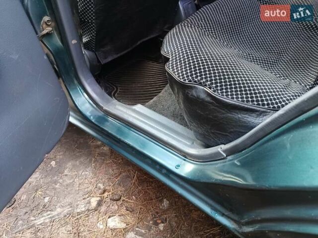 Зелений Деу Ланос, об'ємом двигуна 1.5 л та пробігом 293 тис. км за 1800 $, фото 8 на Automoto.ua