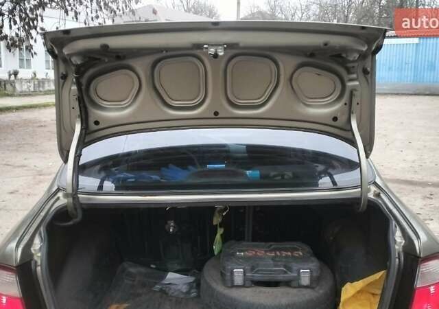 Зеленый Дэу Ланос, объемом двигателя 1.5 л и пробегом 221 тыс. км за 1900 $, фото 8 на Automoto.ua