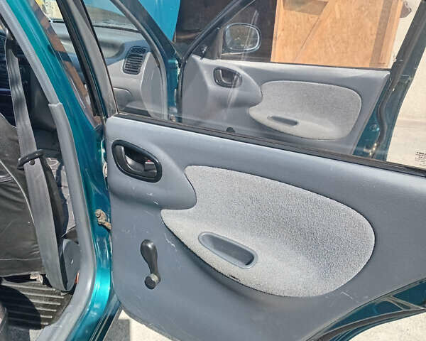 Зеленый Дэу Ланос, объемом двигателя 1.5 л и пробегом 254 тыс. км за 3200 $, фото 9 на Automoto.ua