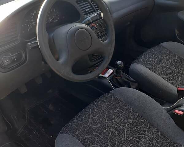 Зеленый Дэу Ланос, объемом двигателя 1.5 л и пробегом 227 тыс. км за 2750 $, фото 3 на Automoto.ua