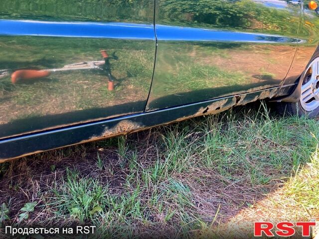 Зеленый Дэу Ланос, объемом двигателя 1.5 л и пробегом 290 тыс. км за 1000 $, фото 9 на Automoto.ua