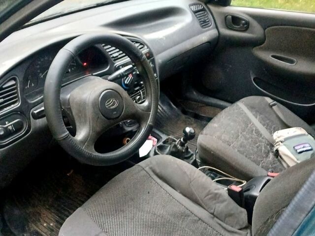 Зеленый Дэу Ланос, объемом двигателя 1.6 л и пробегом 159 тыс. км за 1450 $, фото 3 на Automoto.ua