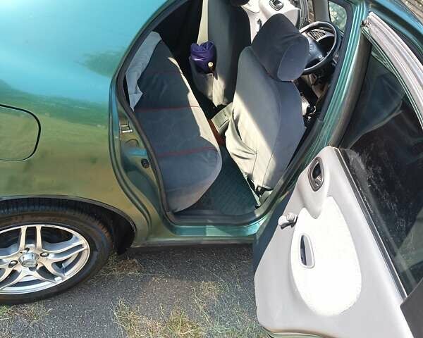 Зеленый Дэу Ланос, объемом двигателя 1.5 л и пробегом 183 тыс. км за 3500 $, фото 10 на Automoto.ua