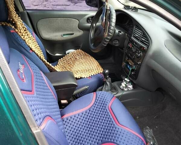 Зелений Деу Ланос, об'ємом двигуна 1.5 л та пробігом 282 тис. км за 3500 $, фото 4 на Automoto.ua