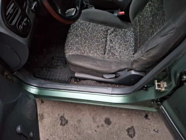 Зеленый Дэу Ланос, объемом двигателя 1.5 л и пробегом 253 тыс. км за 2100 $, фото 4 на Automoto.ua