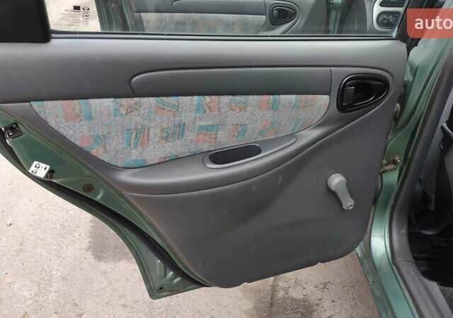 Зеленый Дэу Ланос, объемом двигателя 1.6 л и пробегом 228 тыс. км за 2100 $, фото 13 на Automoto.ua