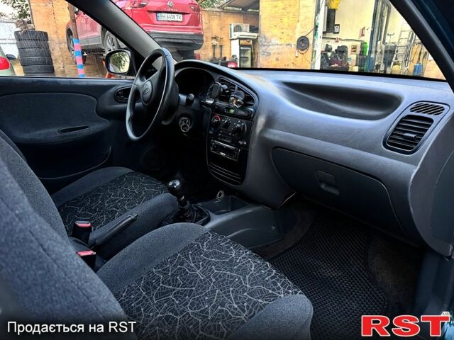 Зелений Деу Ланос, об'ємом двигуна 1.5 л та пробігом 220 тис. км за 3100 $, фото 3 на Automoto.ua