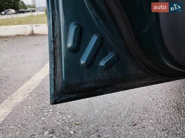 Зелений Деу Ланос, об'ємом двигуна 1.5 л та пробігом 215 тис. км за 2400 $, фото 4 на Automoto.ua