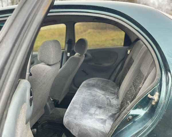 Зелений Деу Ланос, об'ємом двигуна 1.35 л та пробігом 256 тис. км за 1499 $, фото 14 на Automoto.ua