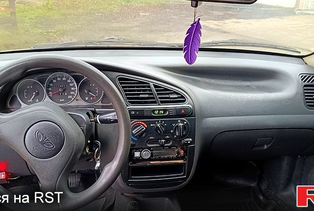 Зеленый Дэу Ланос, объемом двигателя 1.5 л и пробегом 278 тыс. км за 2600 $, фото 7 на Automoto.ua