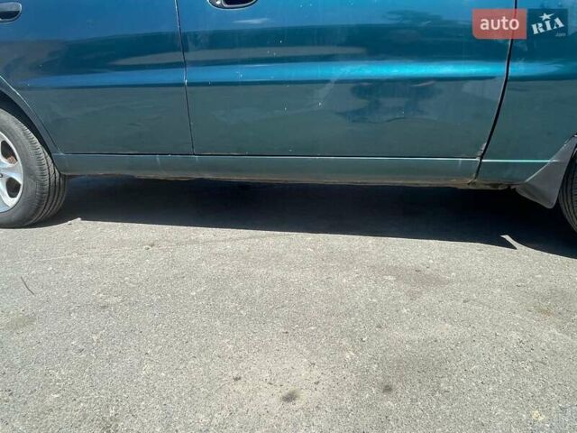 Зеленый Дэу Ланос, объемом двигателя 1.5 л и пробегом 290 тыс. км за 2550 $, фото 4 на Automoto.ua