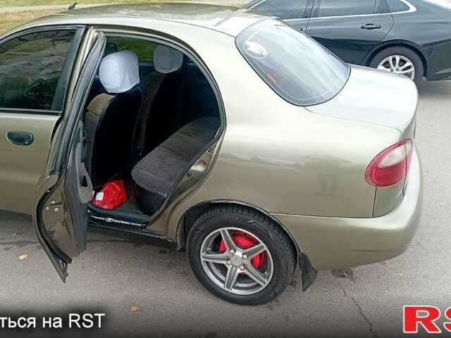 Зеленый Дэу Ланос, объемом двигателя 1.5 л и пробегом 250 тыс. км за 1300 $, фото 5 на Automoto.ua