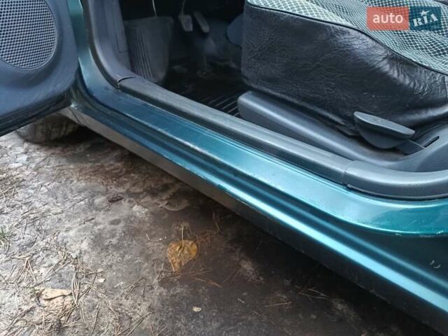 Зелений Деу Ланос, об'ємом двигуна 1.5 л та пробігом 293 тис. км за 1800 $, фото 9 на Automoto.ua