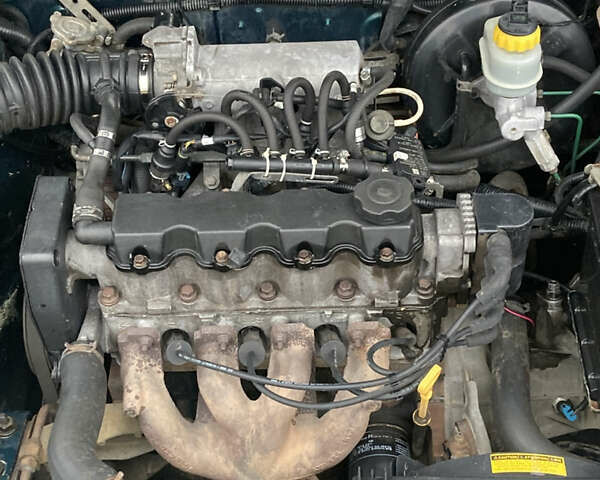 Зеленый Дэу Ланос, объемом двигателя 1.5 л и пробегом 270 тыс. км за 2000 $, фото 9 на Automoto.ua