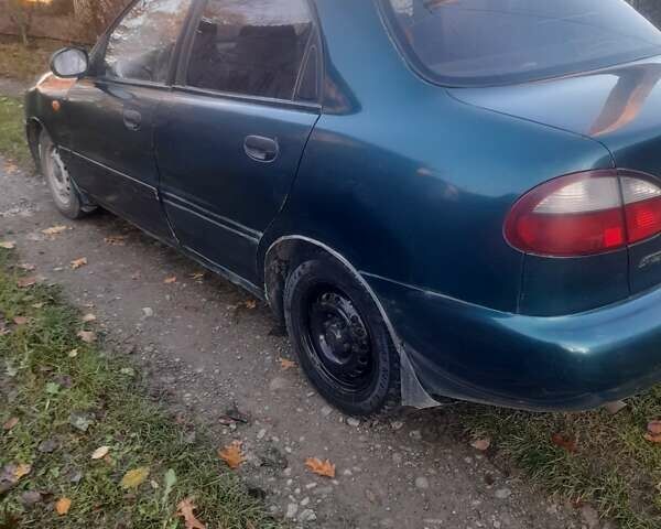 Дэу Ланос 2006 в Стрые на Automoto.ua Зеленый Дэу Ланос, объемом двигателя 1.3 л и пробегом 147 тыс. км за 690 $, фото 25 на Automoto.ua