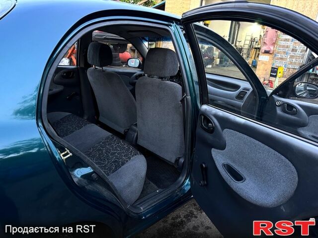 Зелений Деу Ланос, об'ємом двигуна 1.5 л та пробігом 220 тис. км за 3100 $, фото 4 на Automoto.ua