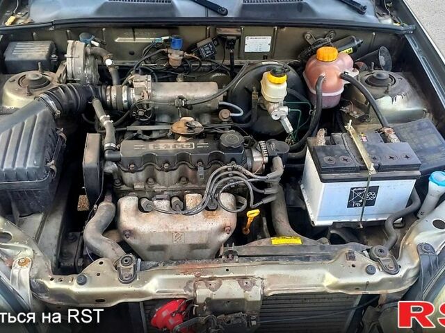 Зеленый Дэу Ланос, объемом двигателя 1.5 л и пробегом 130 тыс. км за 2000 $, фото 6 на Automoto.ua