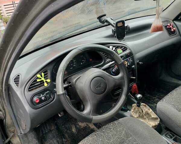 Зеленый Дэу Ланос, объемом двигателя 1.5 л и пробегом 257 тыс. км за 1250 $, фото 3 на Automoto.ua