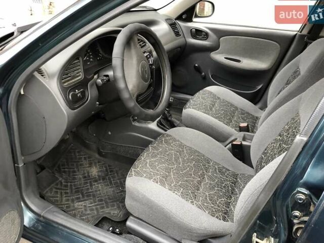 Зеленый Дэу Ланос, объемом двигателя 1.5 л и пробегом 139 тыс. км за 2450 $, фото 8 на Automoto.ua