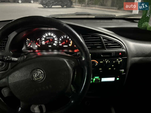 Зелений Деу Ланос, об'ємом двигуна 2 л та пробігом 245 тис. км за 2300 $, фото 21 на Automoto.ua