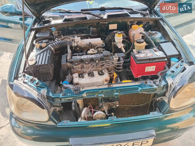 Зеленый Дэу Ланос, объемом двигателя 1.5 л и пробегом 254 тыс. км за 3200 $, фото 5 на Automoto.ua