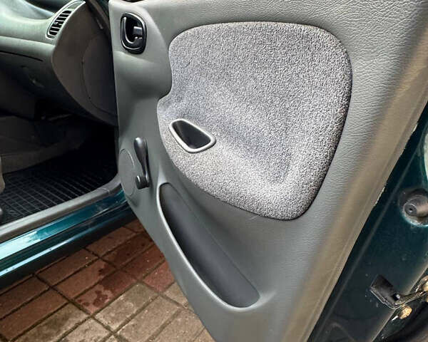 Зеленый Дэу Ланос, объемом двигателя 1.5 л и пробегом 220 тыс. км за 2900 $, фото 11 на Automoto.ua