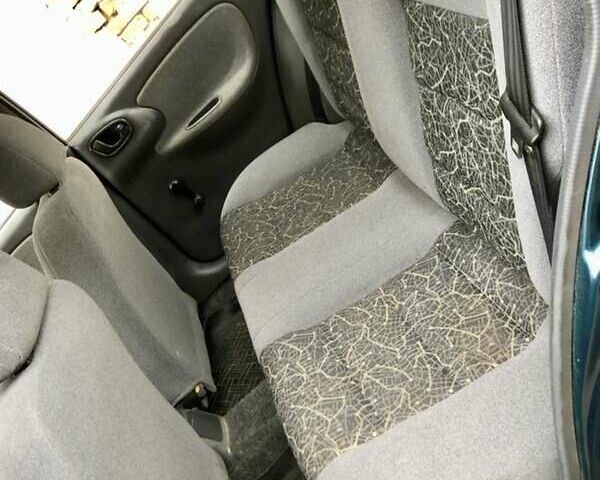 Зеленый Дэу Ланос, объемом двигателя 1.5 л и пробегом 139 тыс. км за 2450 $, фото 7 на Automoto.ua