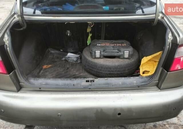 Зеленый Дэу Ланос, объемом двигателя 1.5 л и пробегом 221 тыс. км за 1900 $, фото 7 на Automoto.ua